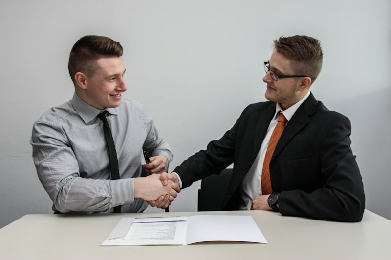 Business partners shaking hands on a deal